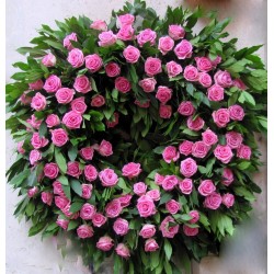 Corona media di rose rosa 
