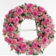 Corona di rose e fiori rosa di arredo 
