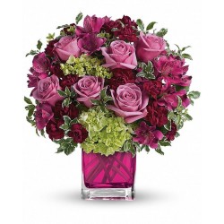 Rondò di fiori in vaso di vetro