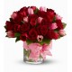 Composition-glass tulips and red roses