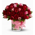 Composition-glass tulips and red roses